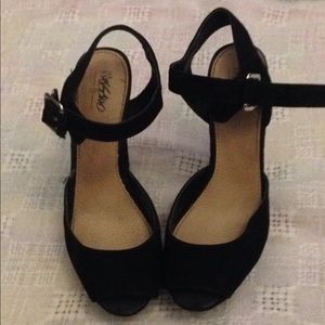 Black strapped heels